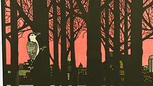 A poster with a bird sitting in a tree.