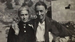 A black and white photo of a man and woman.