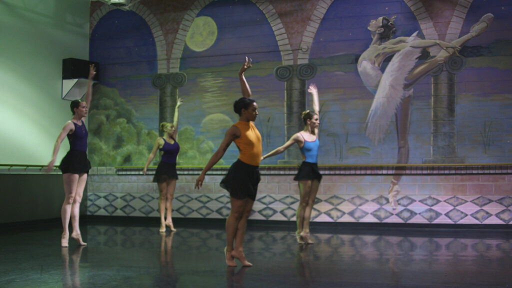 4 ballet dancers practice in a "ballet" themed room