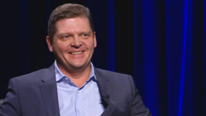 Robert K. Meya smiling during an interview