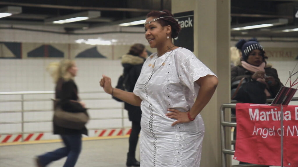 Martino Bruno singing in a busy New York Subway.