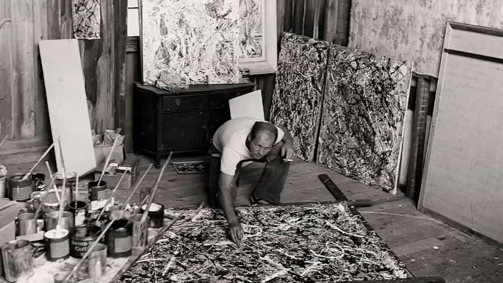 Jackson Pollock painting on the floor "Autumn Rhythm."