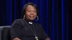 Reverend Margaret McFadden sitting for an interview with COLORES.