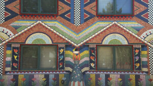 A colorful building with many windows.