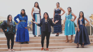 A group of women posing for a photo.