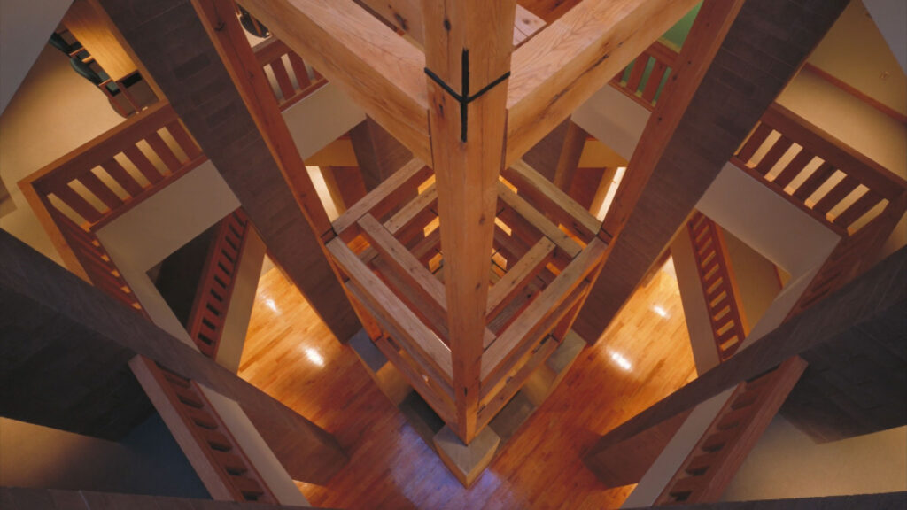 A wood structure with a wood floor.