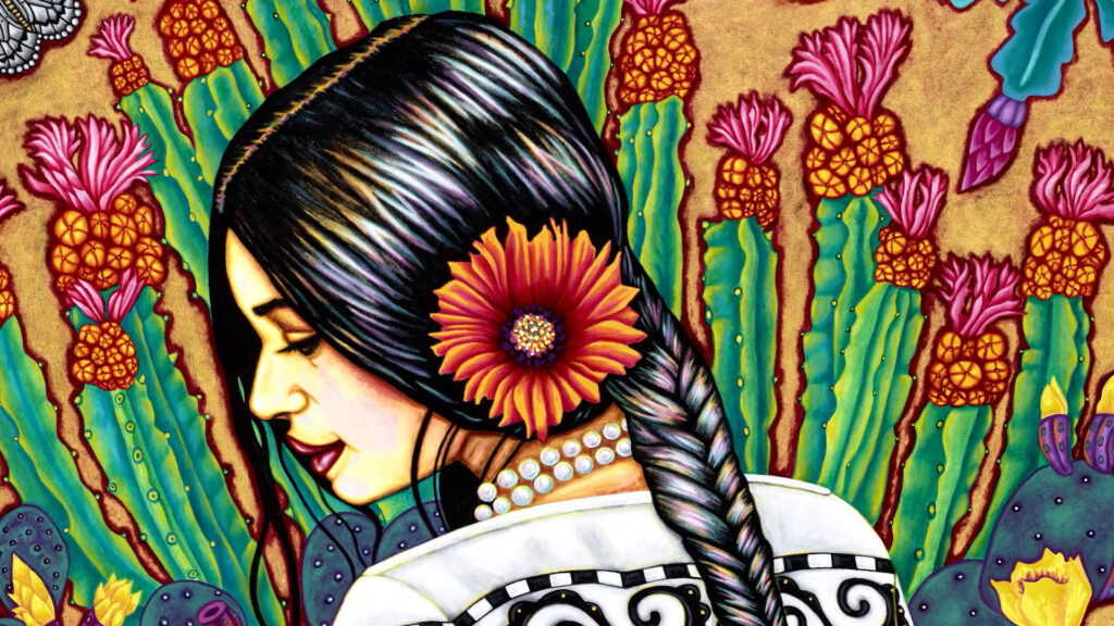 A woman with a braid and a large flower in her hair stands against a vibrant background of cacti and blooming flowers, wearing a white garment with black patterns and pearl necklaces.
