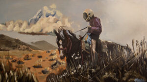 A person wearing a helmet and shorts rides a horse through a dry, grassy landscape with mountains and clouds in the background.