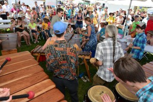 A group of people playing percussion instruments.