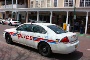 A police car parked on a street.