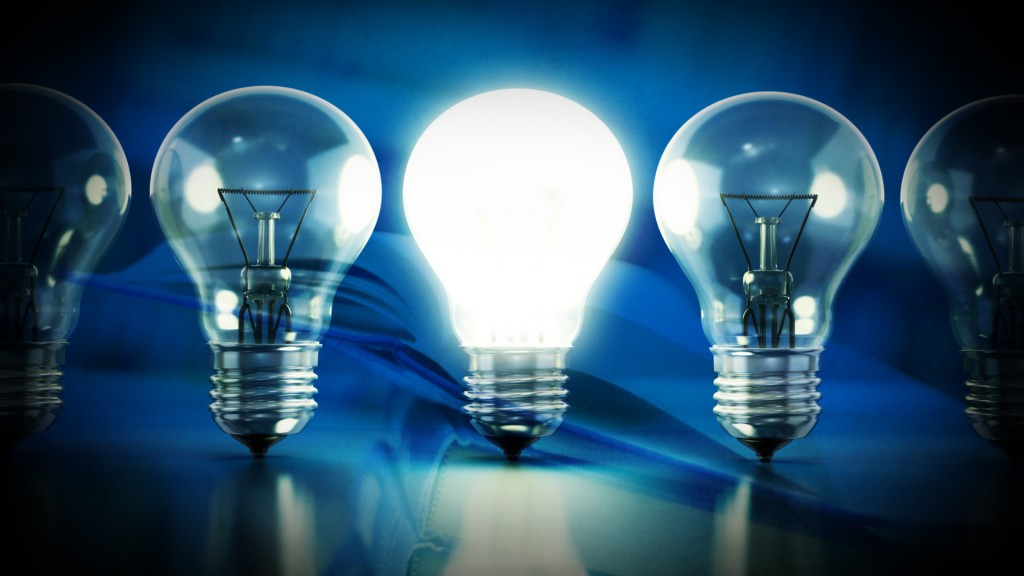 A group of light bulbs with a light bulb in the middle.
