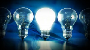 A group of light bulbs with a light bulb in the middle.