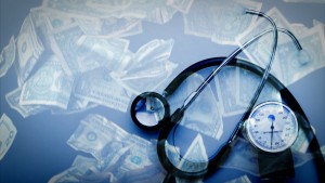 A stethoscope and money on a blue background.