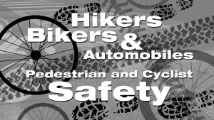 A poster with the words hikers, bikers and automobiles pedestrian and cyclist safety.