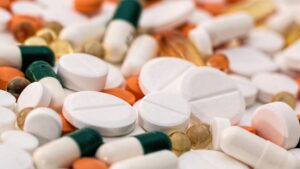 Close-up of an assortment of pills, tablets, and capsules.