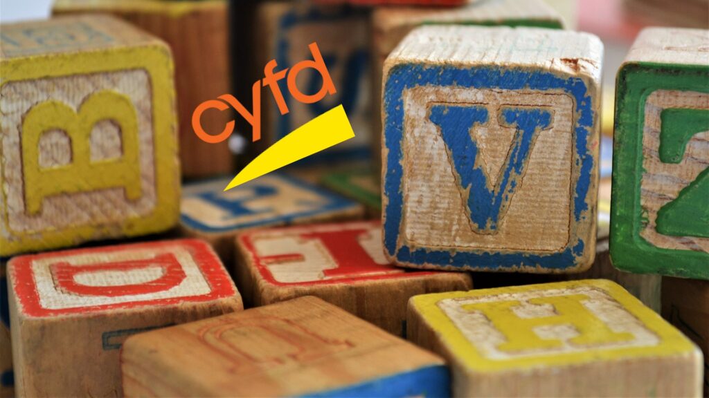 Composite of CYFD logo, along with several children's letter blocks.