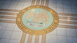 The seal of New Mexico, printed onto a tile floor.