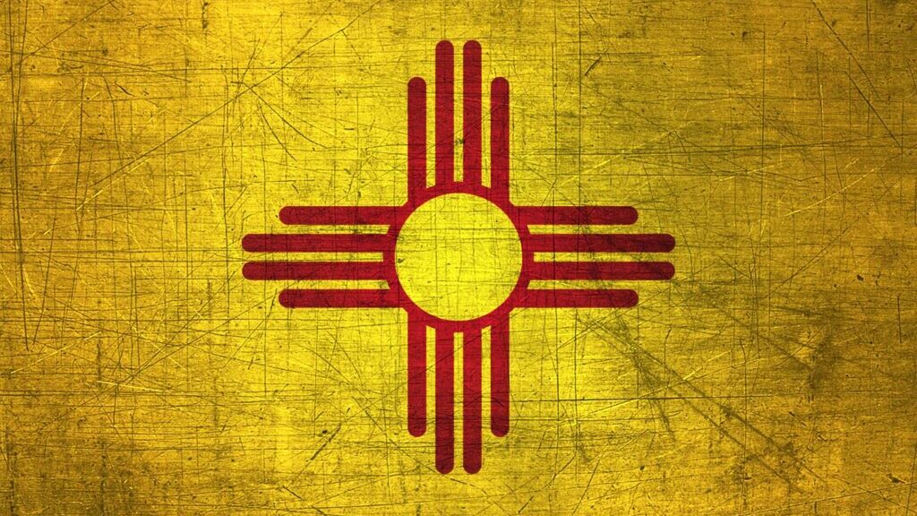 A rustic, metallic New Mexico flag.