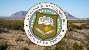 Composite of the seal of the U.S. Census Bureau, with the New Mexican desert in the background.