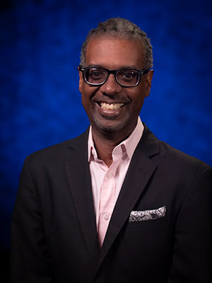 NMPBS_Headshot_Gene-Grant-xtrasmall Portrait of Gene Grant.