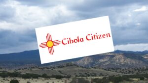 Composite of logo for Cibola Citizen, with background of the Sandia mountains.