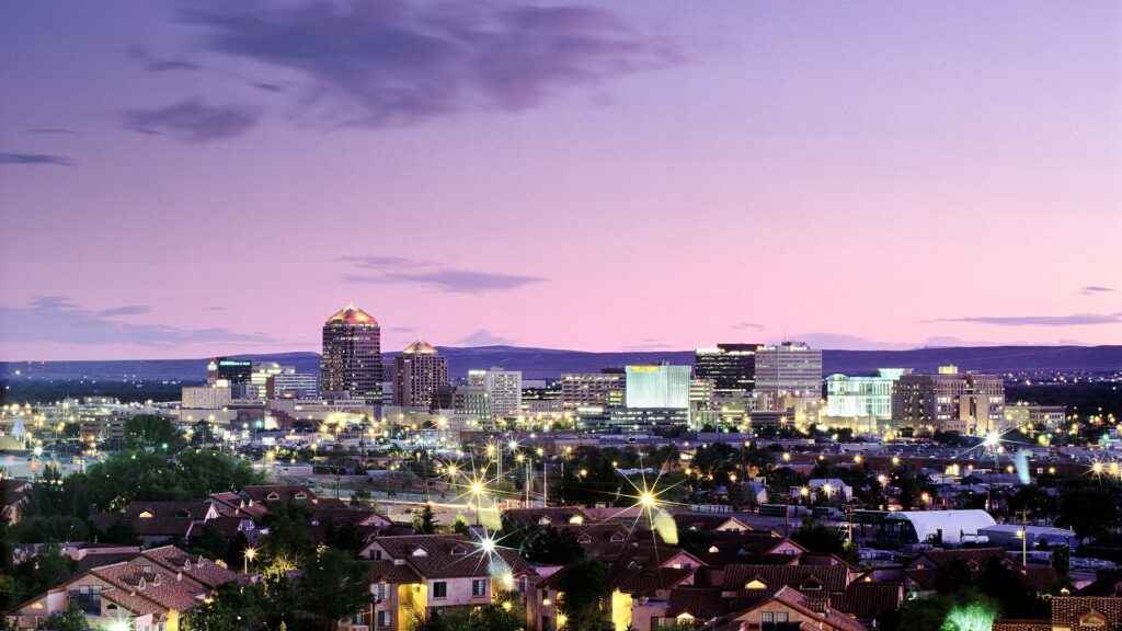 View of downtown Albuquerque at sunset from afar.