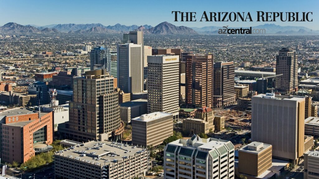 Aerial view of downtown Phoenix, with superimposed text "THE ARIZONA REPUBLIC".