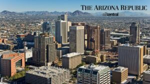 Aerial view of downtown Phoenix, with superimposed text "THE ARIZONA REPUBLIC".