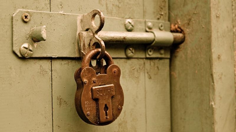 Close-up of a lock on a door.