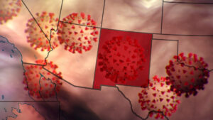 Composite of coronaviruses flying under a U.S. map.