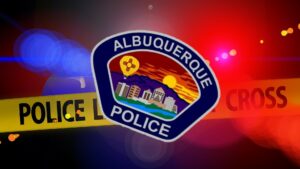 Composite of siren lights, a do-not-cross tape, and insignia for Albuquerque Police.