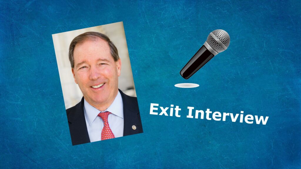 Composite of portrait of Tom Udall, a microphone, and the label "Exit Interview".