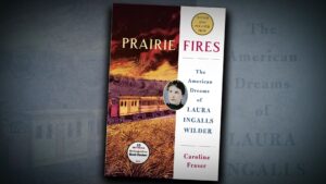 A book cover of "PRARIE FIRES: The American Dreams of LAURA INGALLS WILDER".