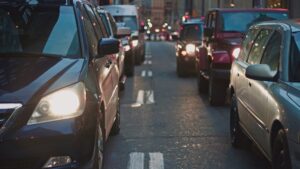 Cars jam up on a city street.