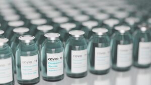 Small bottles with label reading "Coronavirus Vaccine".
