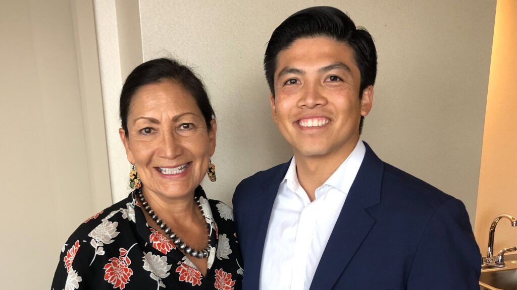 Paa Wee Rivera stands with Interior Secretary Deb Haaland.