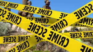 "CRIME SCENE" tape covers mounments.