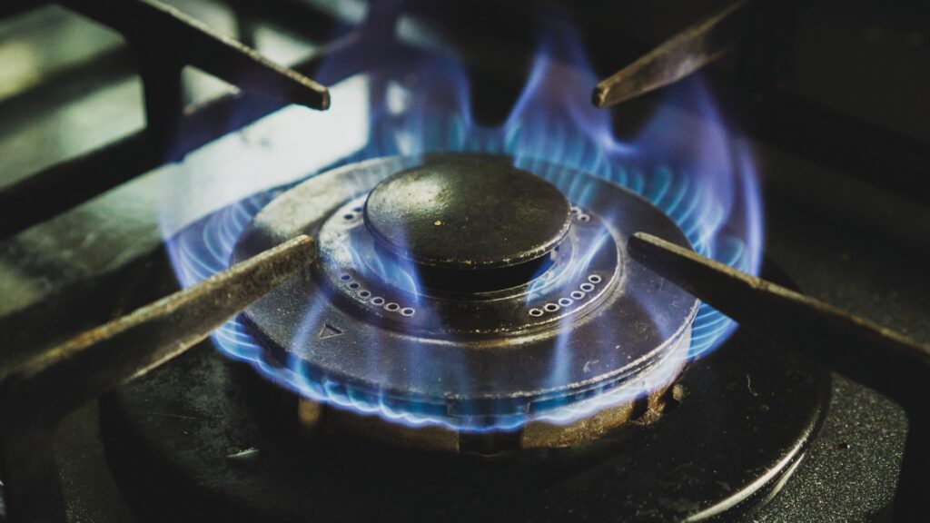 The flames of a burner on a gas stove.