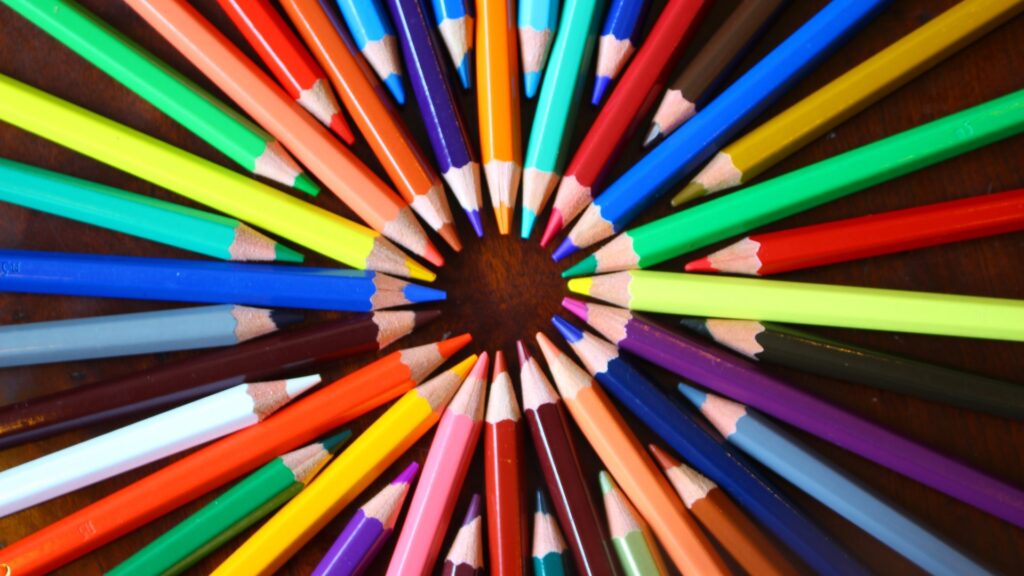 An array of colored pencils organized in a circle.