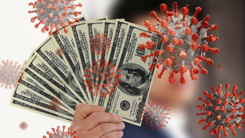 A hand holding several $100 dollar bills, with CG coronaviruses superimposed.