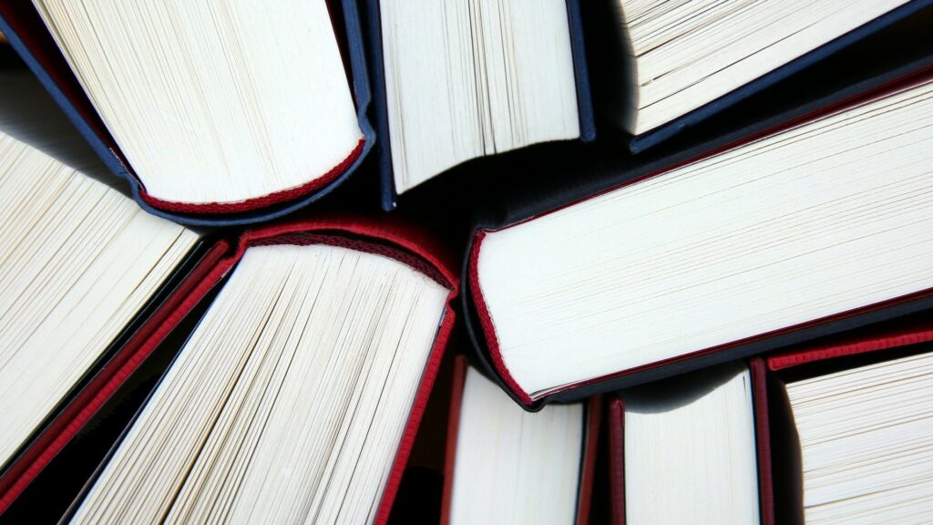 Close up of bottom/top of books standing in a bundle