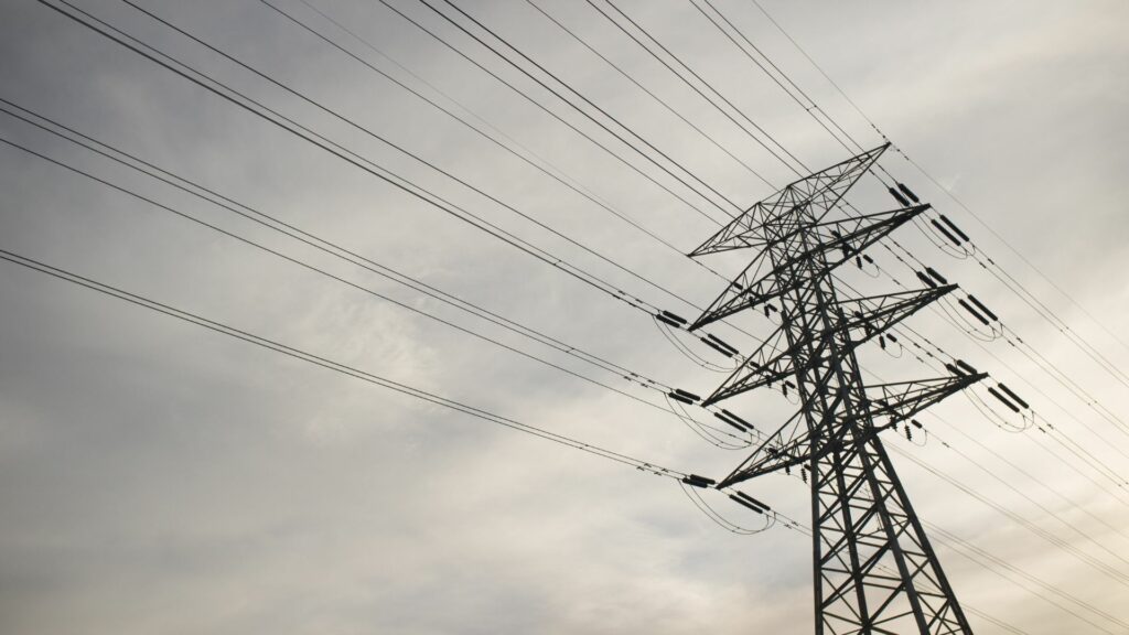 Powerlines in a cloudy sky.