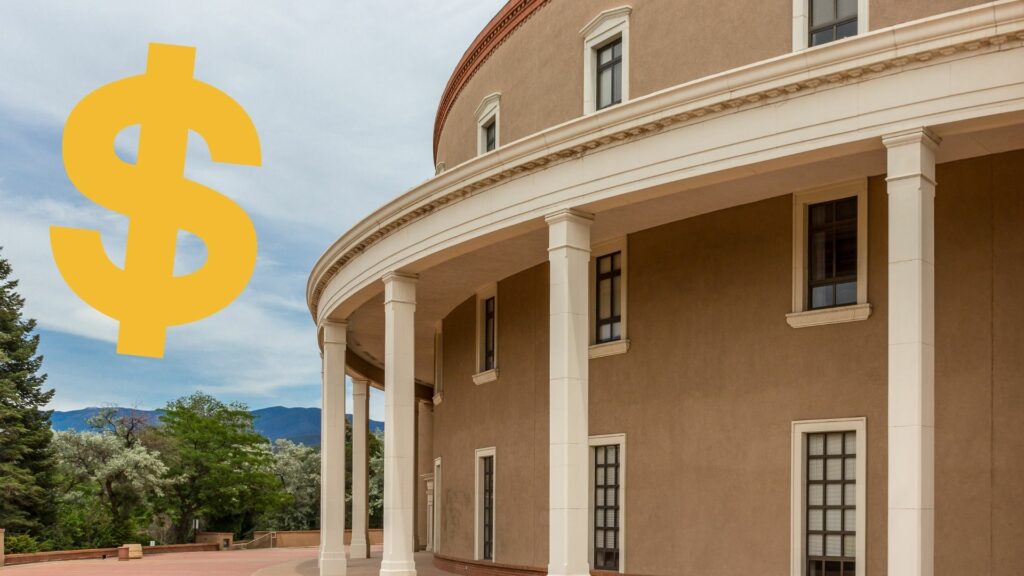 The side of the Roundhouse with a yellow dollar sign superimposed.