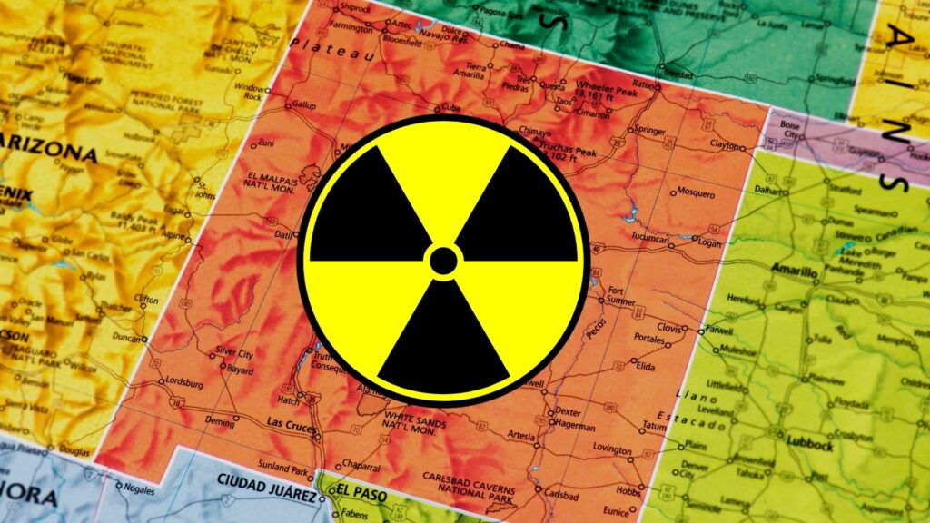 A colorful map of the states with New Mexico in the center with a Radioactive symbol superimposed.