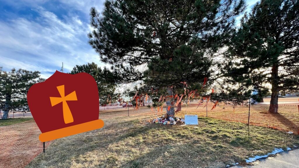 A picture of a memorial tree in a park with a cartoon religious hat superimposed.