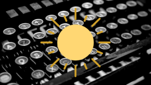 A black and white photo of the letters on a typewritter and a yellow cartoon sun superimposed.