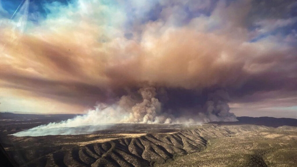 An aerial shot of a plume of smoke from a fire. Courtesy of the U.S. Forest Service.