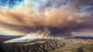 An aerial shot of a plume of smoke from a fire. Courtesy of the U.S. Forest Service.
