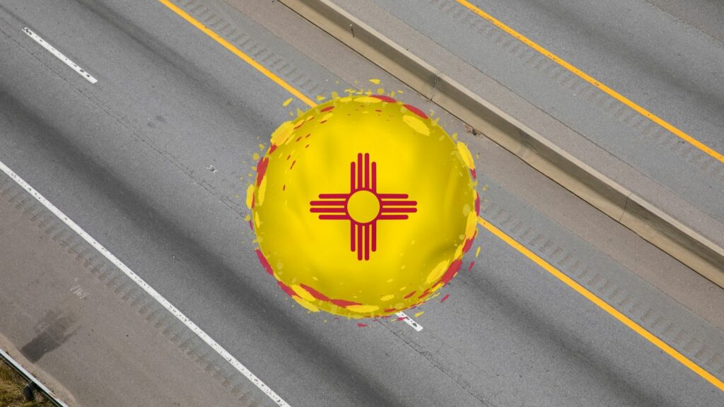 A overhead picture of an interstate and a circular graphic with the zia symbol over top.