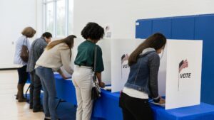 A group of people voting.